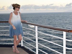 Woman standing on cruise ship