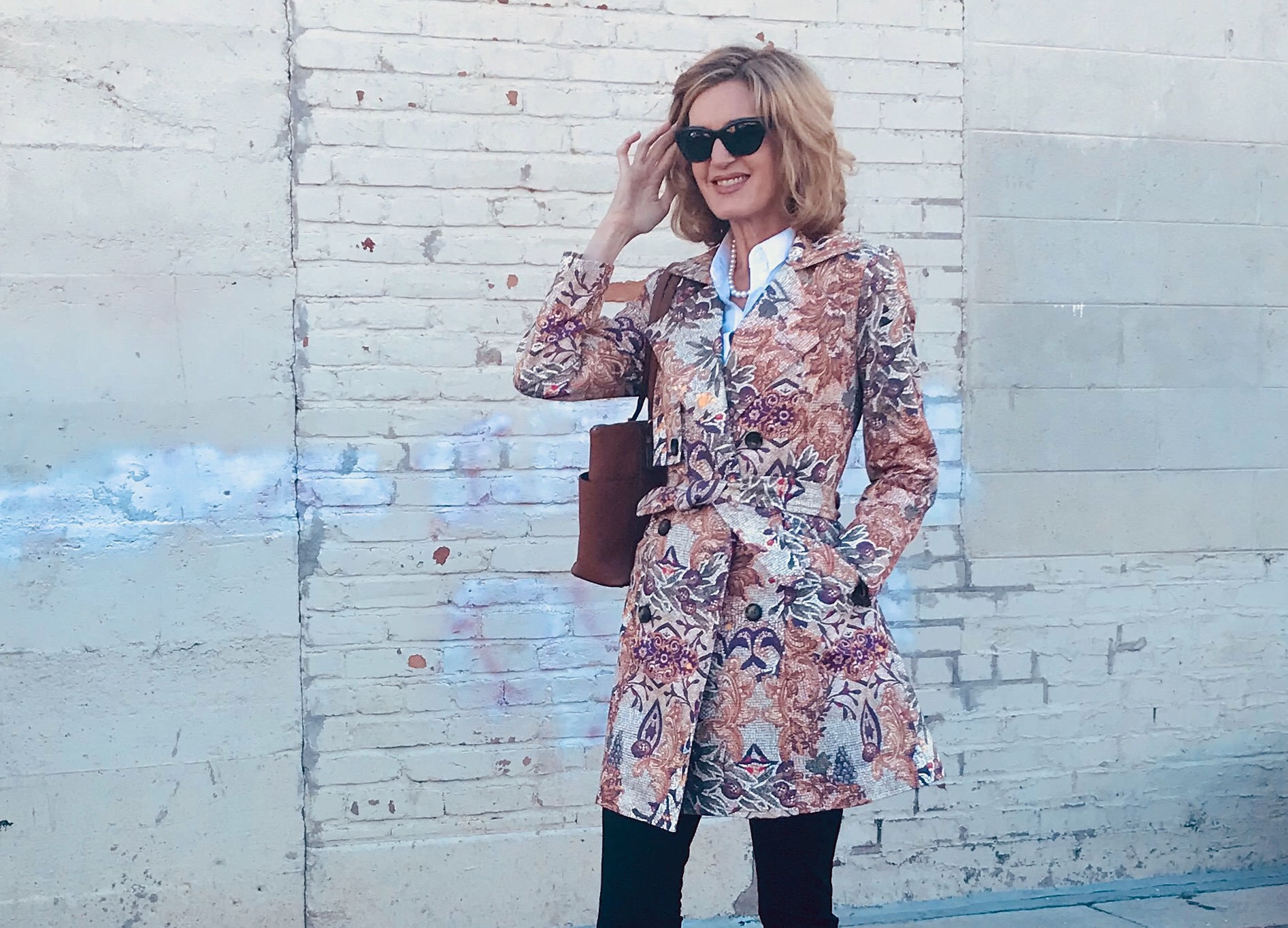 Woman wearing floral coat