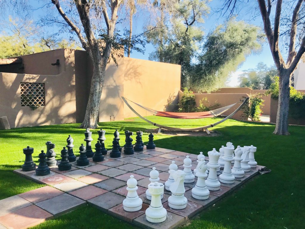 Giant chess set and hammock at Hermosa Inn