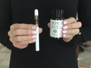 Person holding CBD products