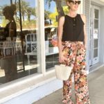 Wide-leg floral palazzo pants as a stylish alternative to shorts in summer from Lisa at MidlifeinBloom.com. Fashion for women over 40. 