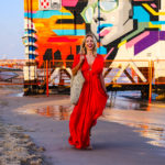 Woman in red maxi dress