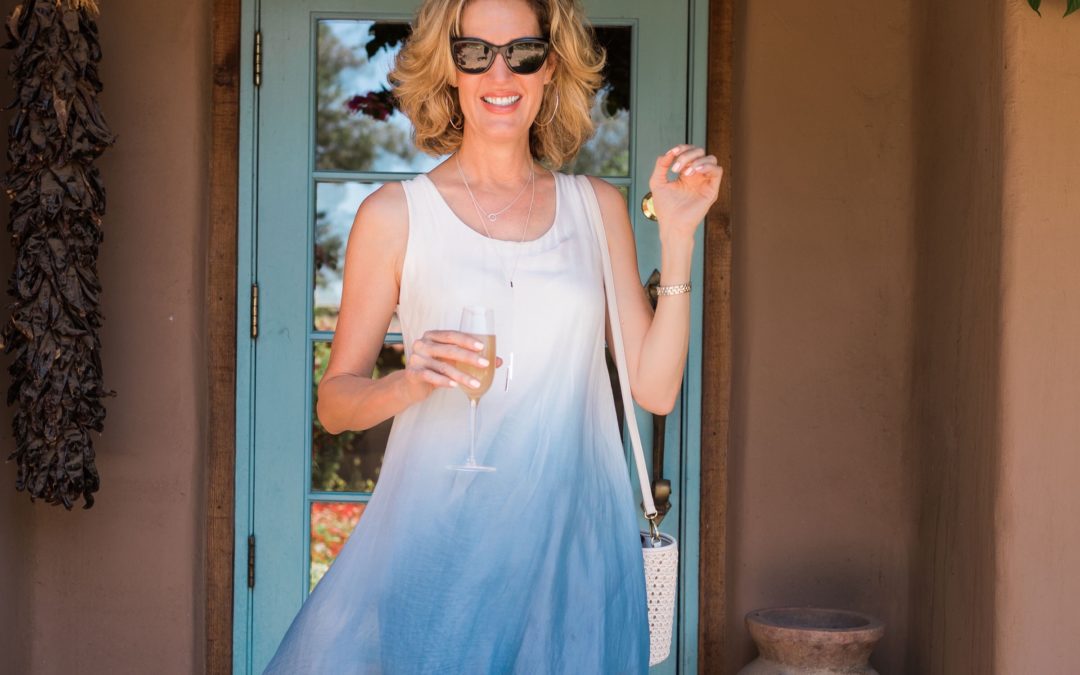 woman in blue and white ombre dress for brunch