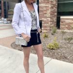 women wearing white blazer and shorts outfit