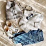 Lisa from MidlifeInBloom shows a casual, neutral fall outfit flatlay