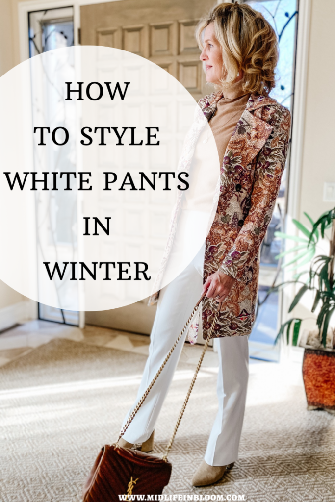 Pinterest cover image for white pants styled for winter from Lisa at Midlifeinbloom.com