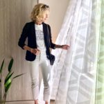 Lisa from Midlifeinbloom.com shows white outfit with blazer